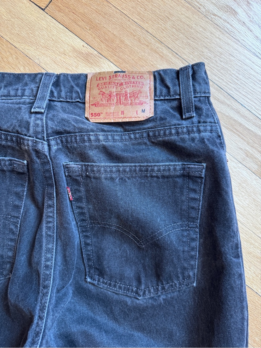 Levi's vintage 90s 550 Relaxed Fit Tapered Leg high rise black denim jeans fall